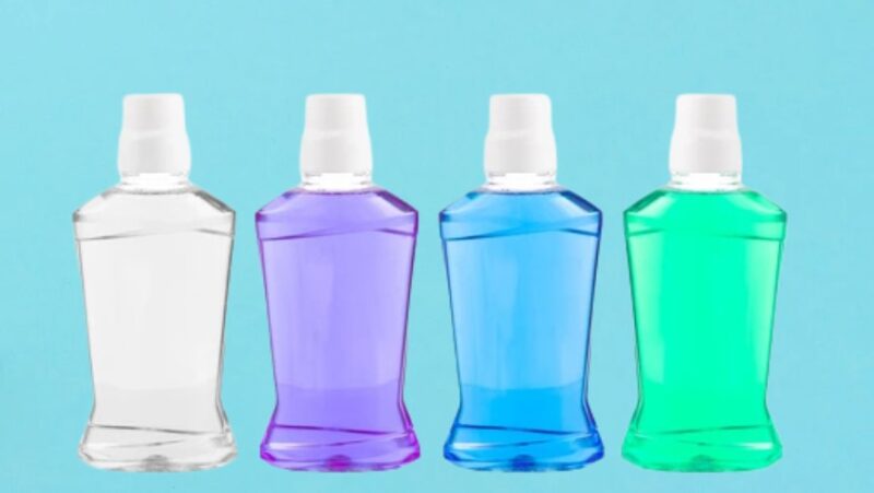 Mouthwash bottles on a blue background